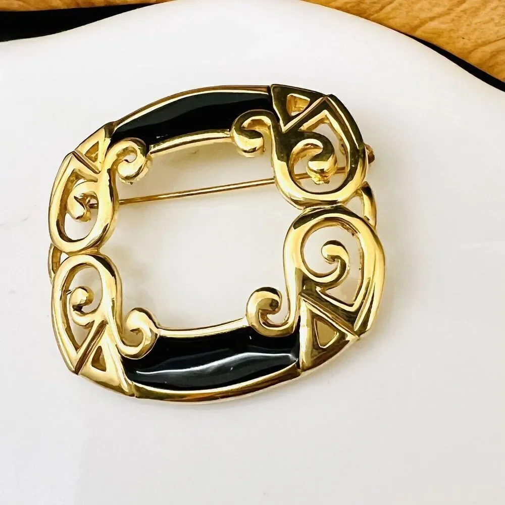 Vintage GINNIE JOHANSEN Gold Tone Black Enamel Brooch Open Work 4093